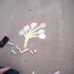 pieces of chalk beside artwork of chalk "tree" ?