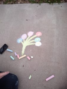 pieces of chalk beside artwork of chalk "tree" ?